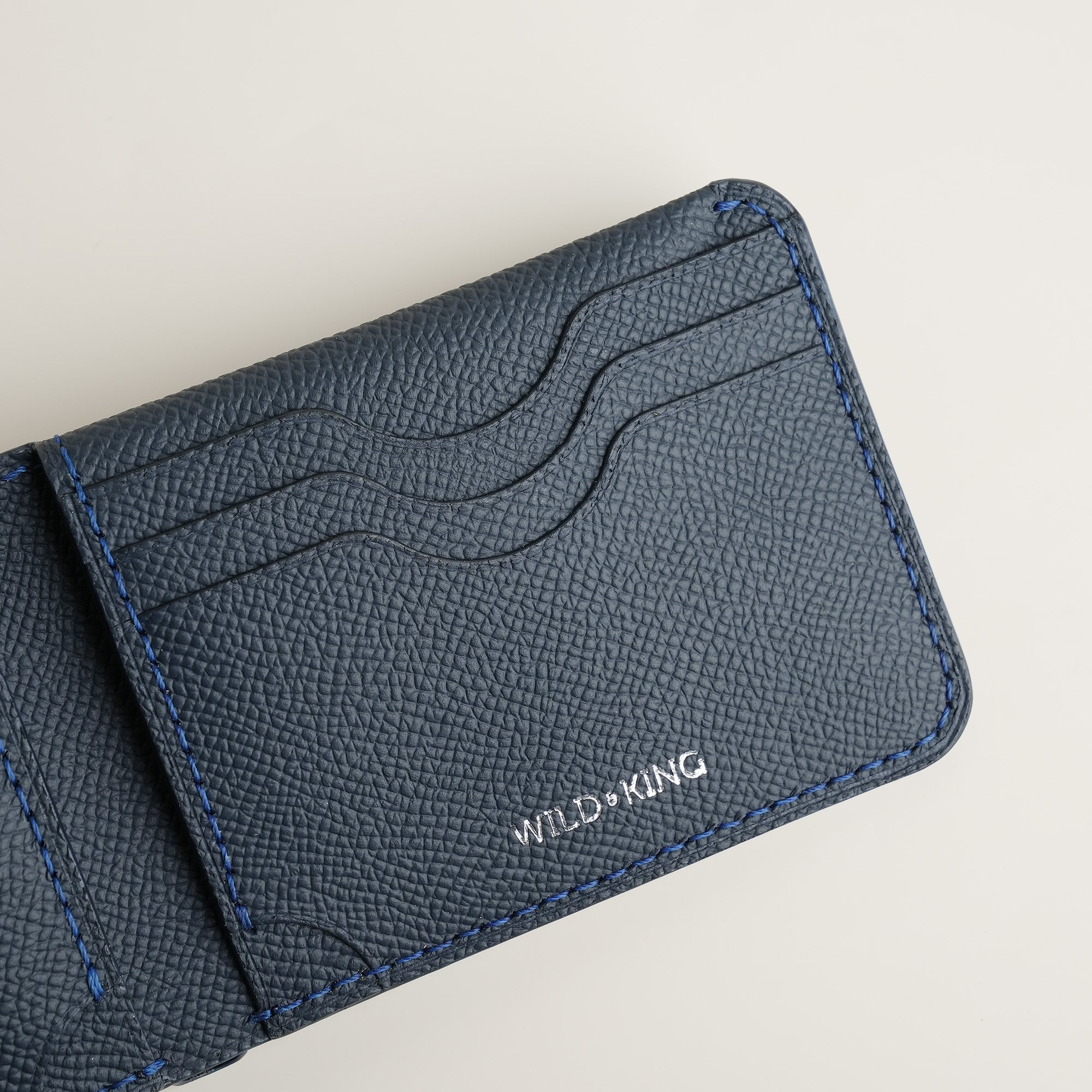 Navy Epsom Leather Wing Bifold Wallet - Stupid Camelo